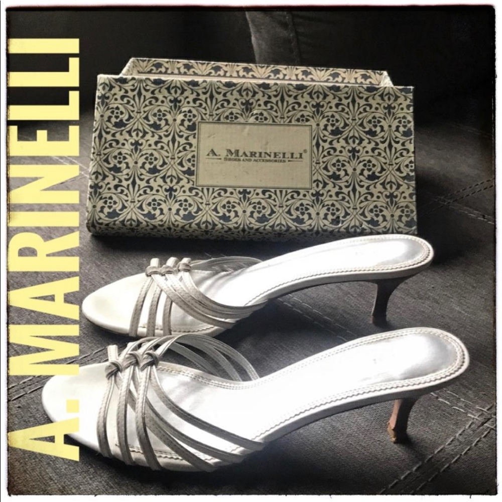A. Marinelli white heels